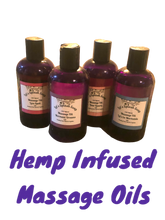 Load image into Gallery viewer, Bottles of hemp-infused CBD massage oil with rose quartz crystals from Let's Splash Soap.