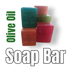 Load image into Gallery viewer, Stack of colorful vegan olive oil soap bars with embossed tree design, gentle and moisturizing, eco-friendly and made in the USA