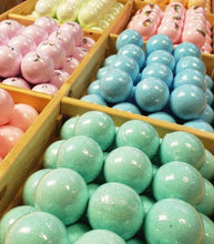 Load image into Gallery viewer, Colorful natural bubble bath bombs arranged in wooden trays for spa relaxation